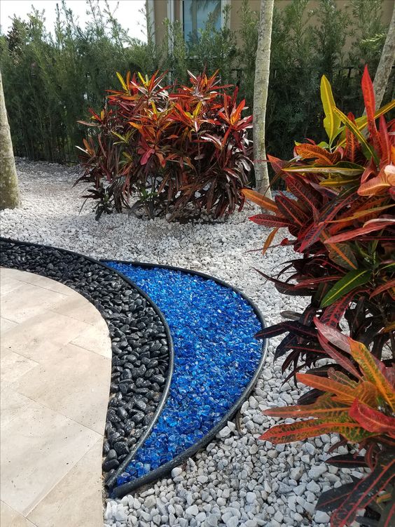 decoracao de jardim com pedras pintadas