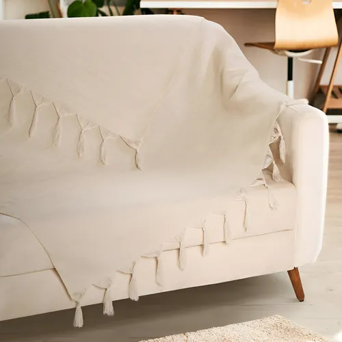 Como Escolher o Tecido Ideal de Manta para o Seu Sofá