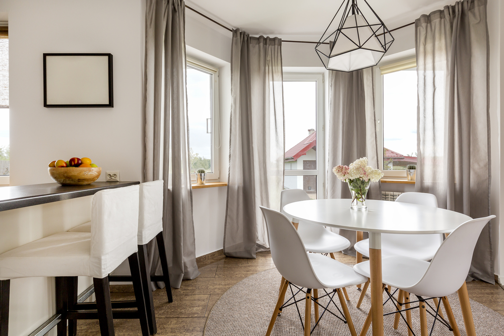 mesa de jantar redonda ou quadrada